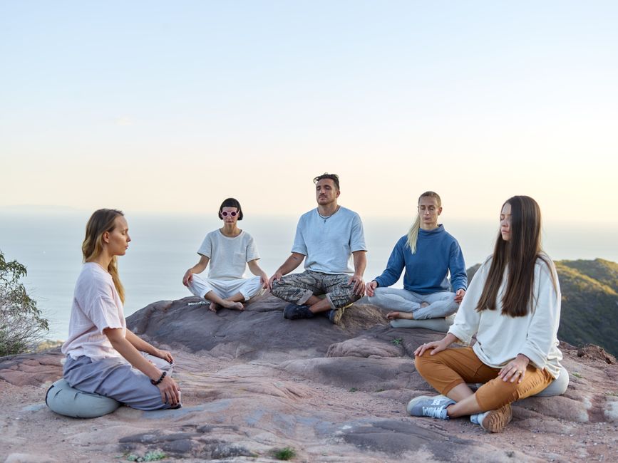 A small group seated in a circle during breathwork