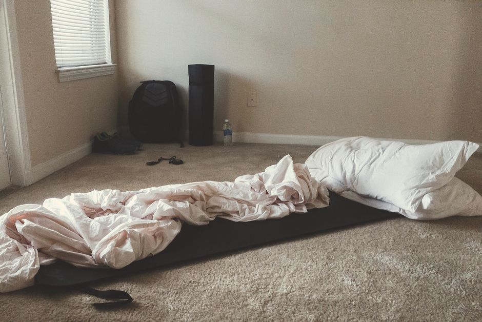 Yin yoga props arranged near a sunlit window